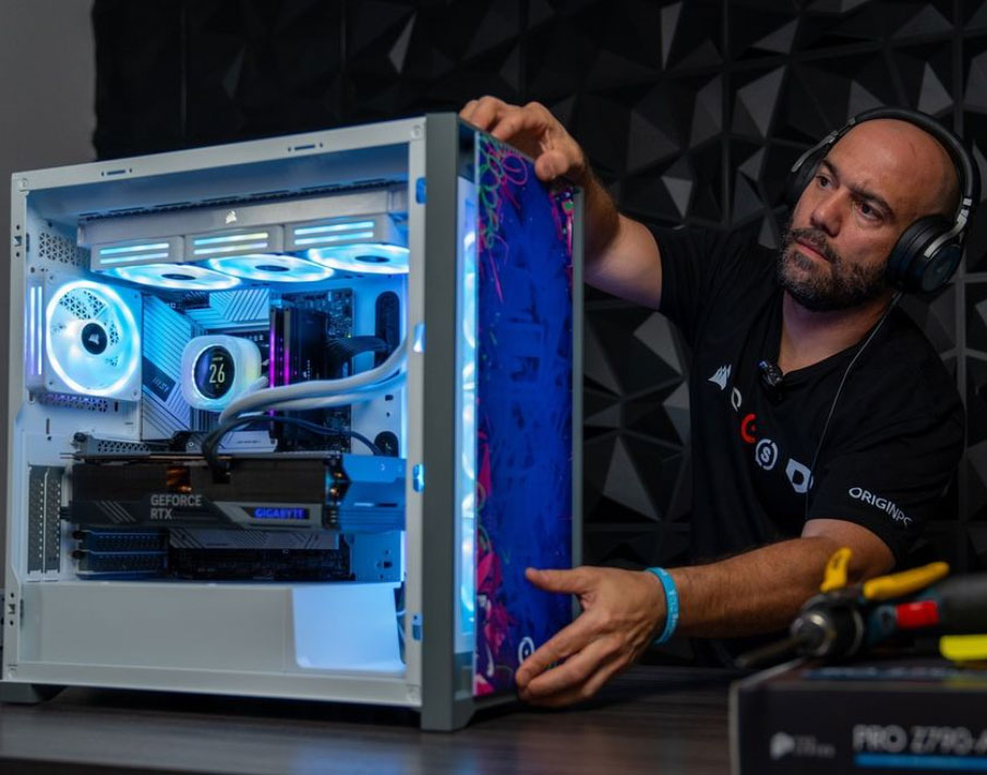 Computer tech building an Origin PC system live on stream